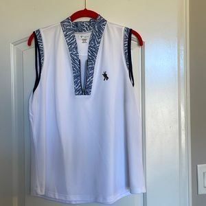 Greg Norman sleeveless golf shirt with logo of Pinehurst Country Club.